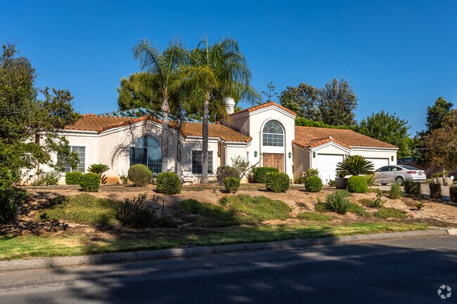 Canyon Ridge boasts a striking big white Spanish-style ranch home.