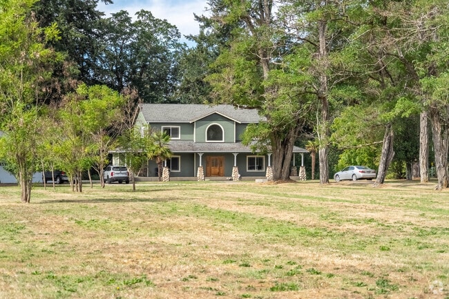 There are farm houses with large plots of land in North Yelm.