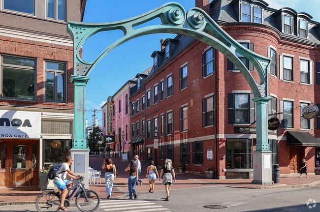 The Chestnut Street Arch serves as a grand gateway, guiding visitors from the edge of the West End to the historic Music Hall where arts and culture come to life.