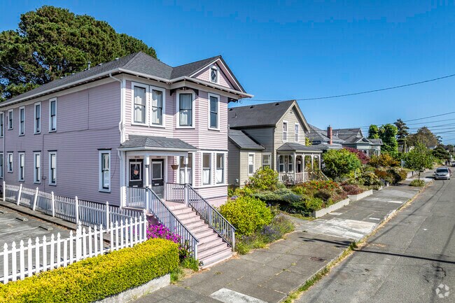 A row of Victorian homes on Broadway Street, some still being updated.
