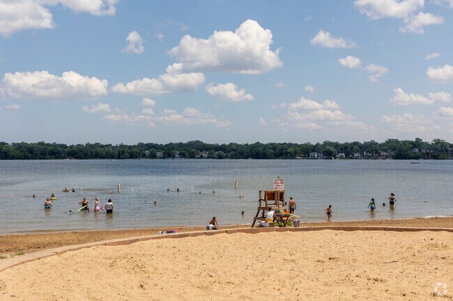Lakefront Park has a beach and marked off swim area to access Round Lake.