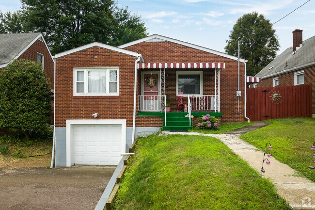 This ranch-syle home in Springdale sits on a hill and had its garage underneath.