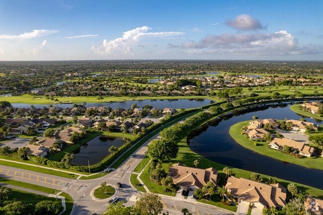 Beautiful waterfront homes in the Lake Charleston neighborhood of Green Acres, FL.