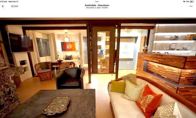 Living room looking at master bed