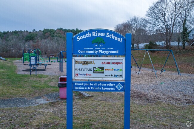South River Elementary School students in Marshfield enjoy the community playground.