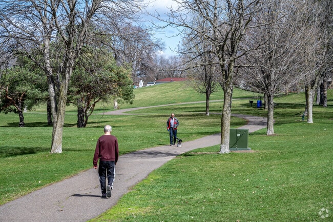 Residents enjoy the short stroll through Maplewood Heights Park.