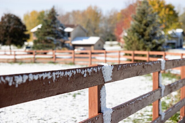 Fresh snow clings to the stable fences in Ray Lake Kettle Grove.