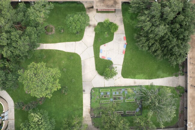 Its campus features modern classrooms, a gymnasium, and outdoor fields.