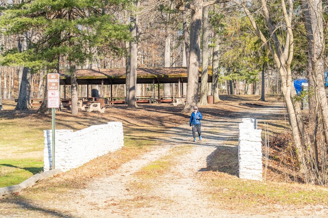 Locals walk the scenic trails at Fenimore Woods Park.