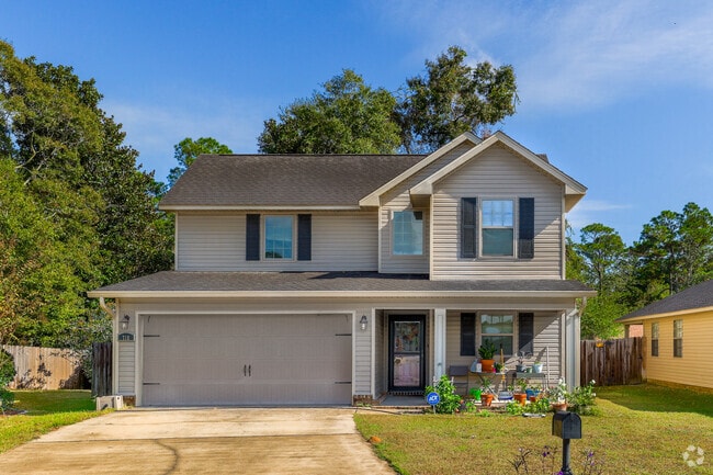 Two‑story homes appear alongside bungalows and townhomes.