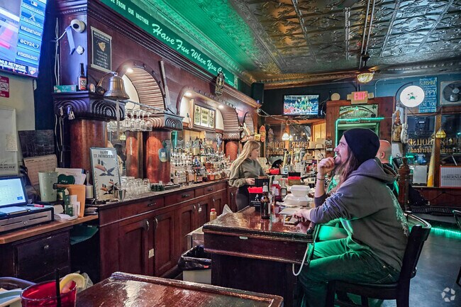 East Carnegie residents enjoy the cozy atmosphere of Riley's Pour House.