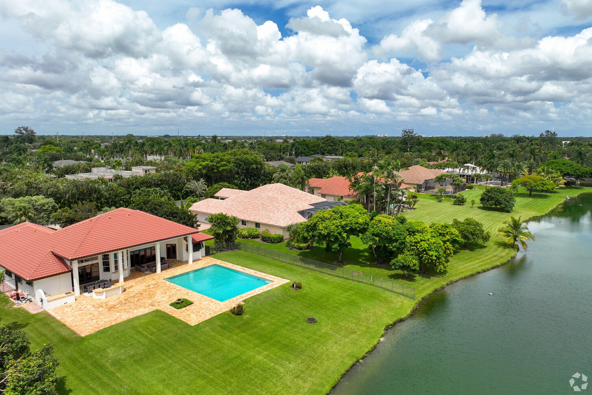 Aerial view of lake side properties in Outer Davie neighborhood.