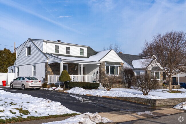 Bungalow homes in Morton often have wide front porches with large overhangs.
