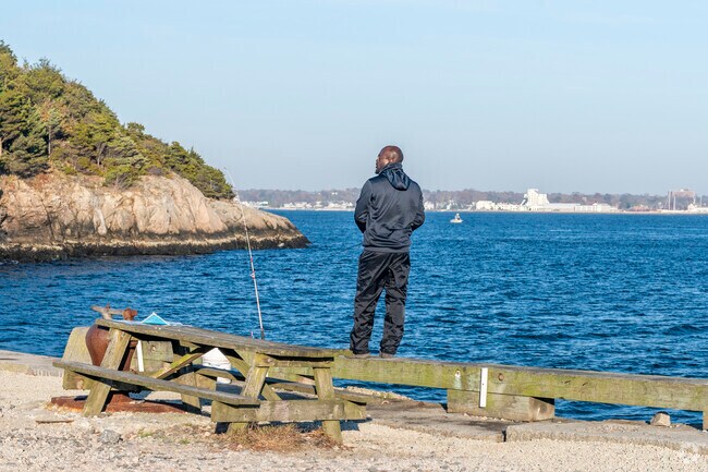 Catch dinner off the rocky coast of Fort Wetherill State Park.