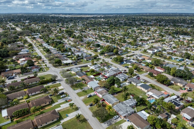 An aerial context of Welwyn Manor shows how lush with greenery the neighborhood is.