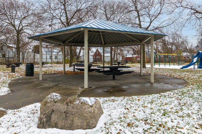 Parents can watch their kids on the playground from the gazebo at Hawthorne Park in Detroit.