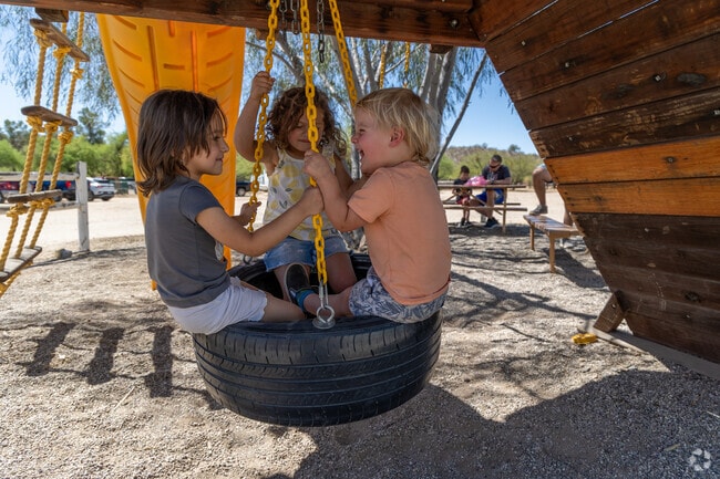 Kids have a blast at the playground at The Rincon Valley Farmer's Market hosted every Saturday.