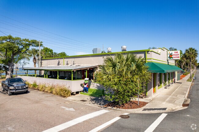 Devor classic dishes like coconut shrimp, fried haddock and crab cakes at the Crazy Gator.