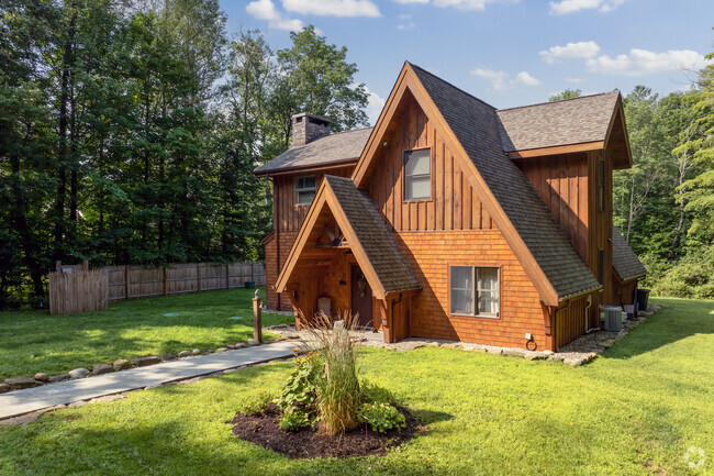 Cabin homes with handcrafted accents dot the countryside of Providence.