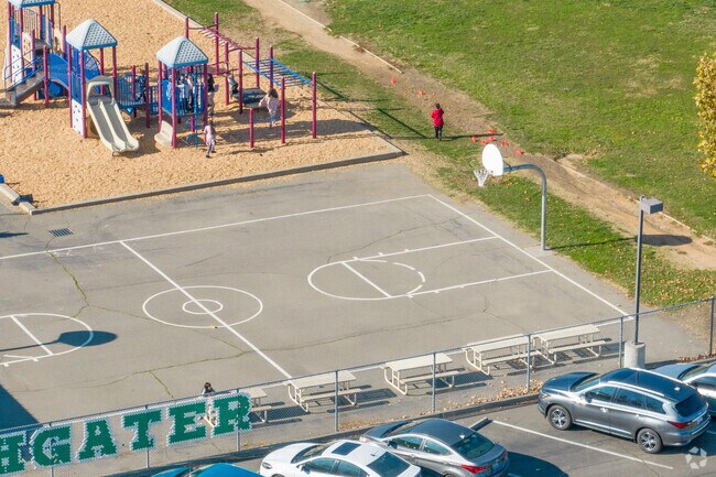 Competitive basketball games take place during recess at Anna Kirckvater Elementary School.