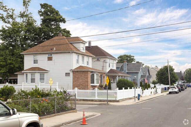 Rows of homes on Roger Ave in Inwood, NY.