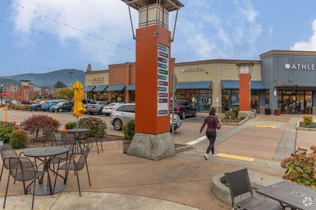 Shoppers explore Newport’s largest retail plaza, home to dozens of national and local stores.