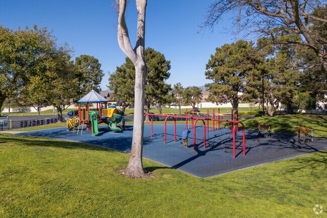Surrounded by tall trees and lots of shade, Stone Creek Elementary has a great playground.