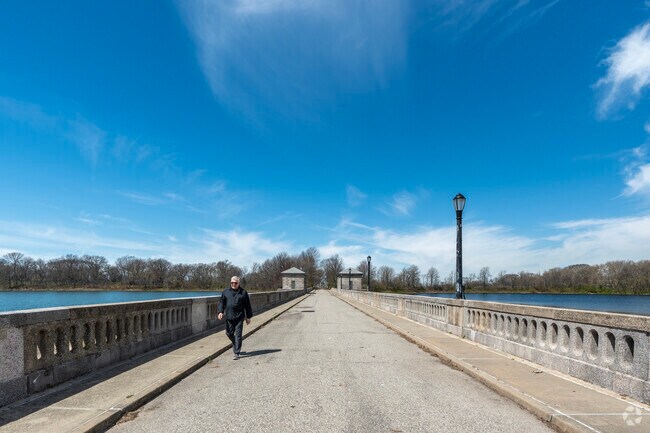 Silver Lake Park is divided in half by a turn-of-the-century stone dam footbridge.