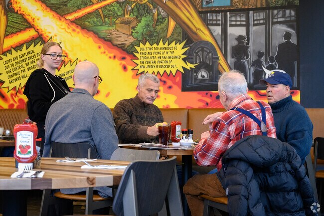 The Oakland Diner is famous for its colorful murals, alongside terrific food.
