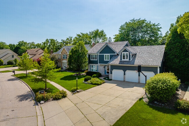 Some Inverness homes have three car garages with spacious driveways.