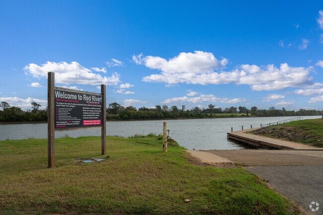 The neighborhood is close to the Red River, offering scenic views and wildlife.