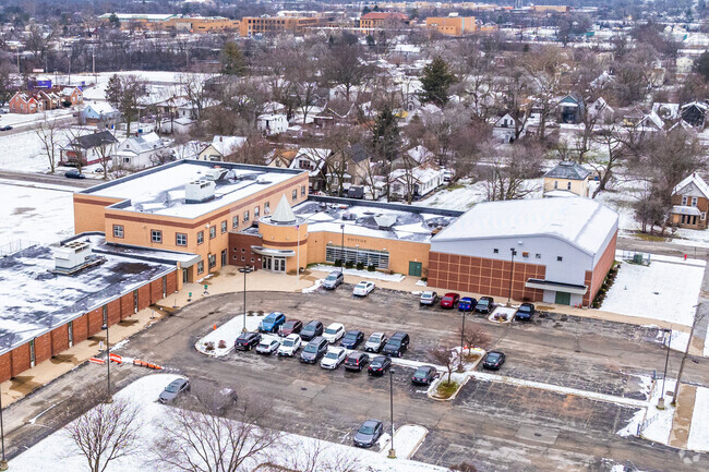 Whittier Elementary School features a yellow and red brick design.