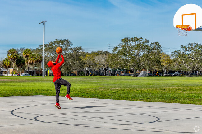 Hit up the basketball court & shoot some hoops in Azalea neighborhood.