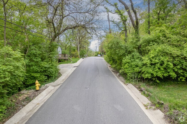Oak and maple trees stretch over the residential streets of East Westwood.