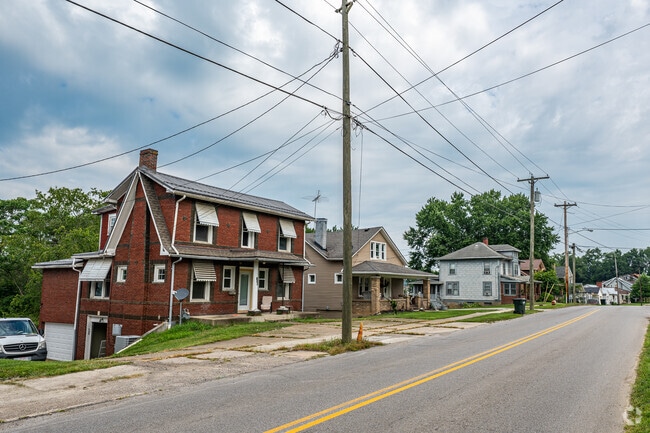 Homes near downtown Cadiz sit close to the street on hilly sidewalks.