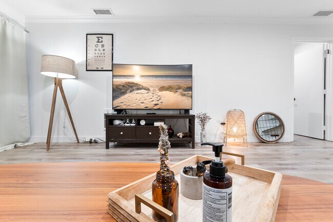 Relax and Unwind: Sink into the Plush Sofa and Dive into Entertainment with the Smart TV.