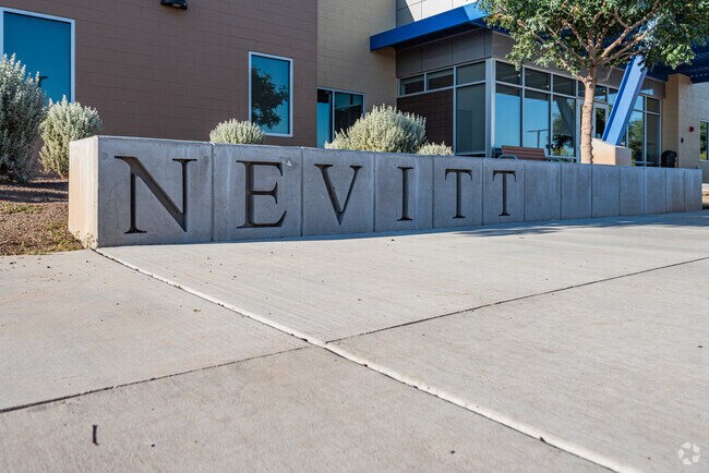 Artistic monument sign just outside the main entrance, Nevitt Elementary School.