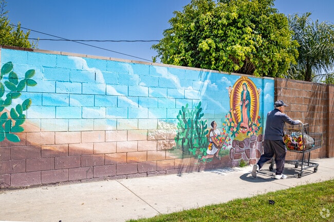 Murals are common among the neighborhood, such as this piece by Hector Ponce, in Arleta, CA.