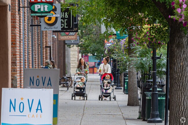 Residents and visitors enjoy leisurely strolls through the charming setting of downtown Bozeman.