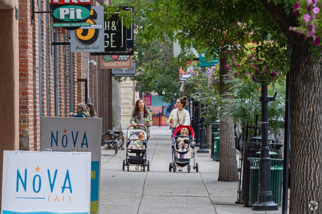 Residents and visitors enjoy leisurely strolls through the charming setting of downtown Bozeman.