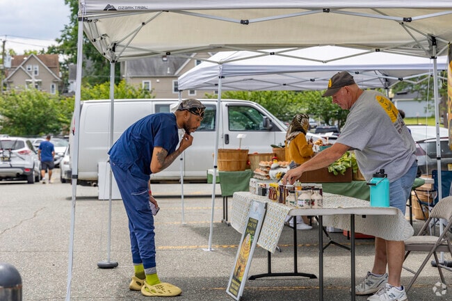 Clifton Farmers Market often features local honey and seasonal produce.