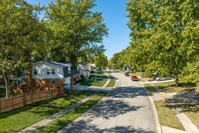 Tree-lined streets showcase the charm of Forest Ridge Quail Hollow just 7 miles from Dayton.