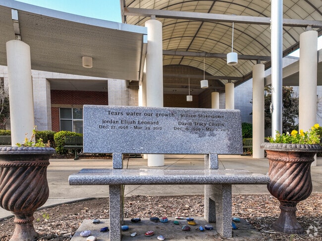 A memorial bench sits outside of Kernodle Middle school in Greensboro.