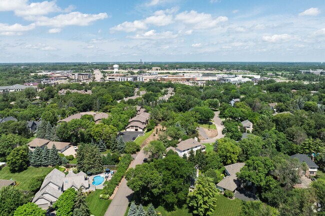The Sherwood Forest area offers diverse housing from affordable townhouses to luxury estates, all surrounded by mature trees that provide natural privacy and scenic beauty.