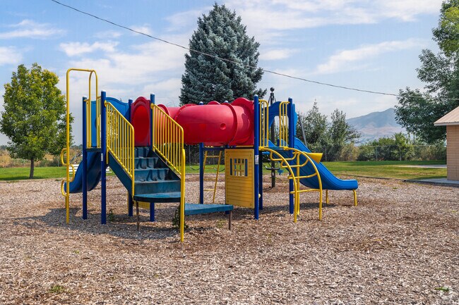 A colorful playground has mountain views at Sugar Park.