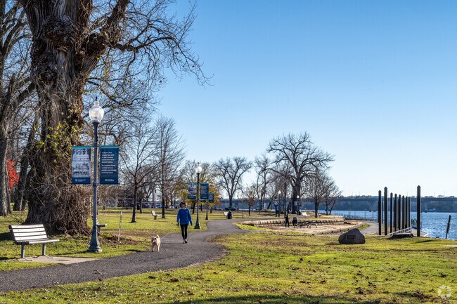 Hudson residents enjoy walking the paths at Lakefront Park near the St. Croix River.