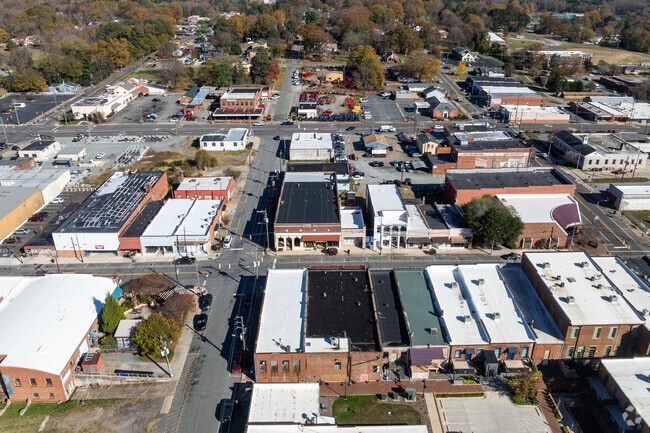 Siler City, sits roughly 32 miles southeast of Greensboro and 54 miles west of Raleigh.