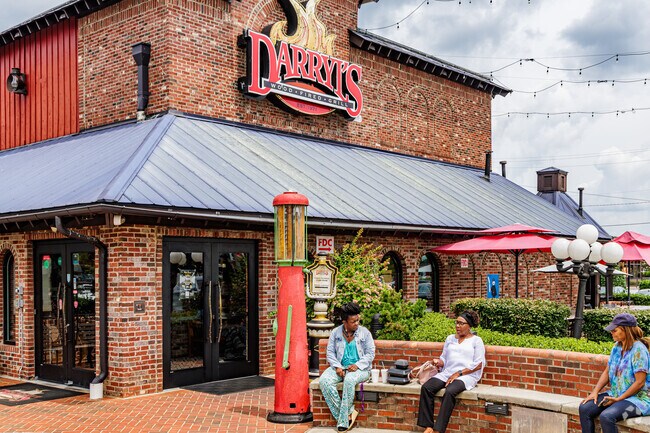 Residents from Rolling Roads relax after lunch at Darryl's Wood Fired Grill.