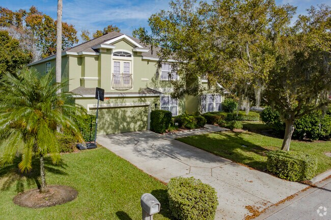 In Lakevue, this spacious American foursquare boats a large well manicured lawn.