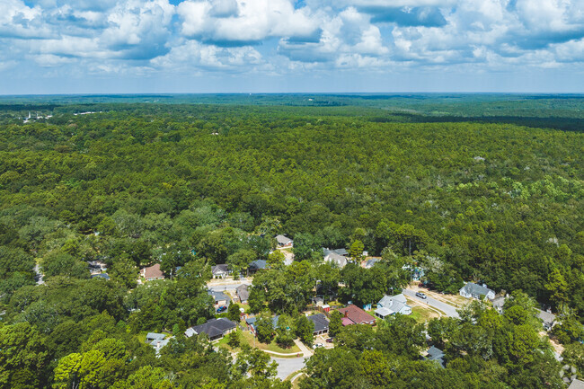 Beau Terra offers residents a quiet neighborhood vibe with many trees.